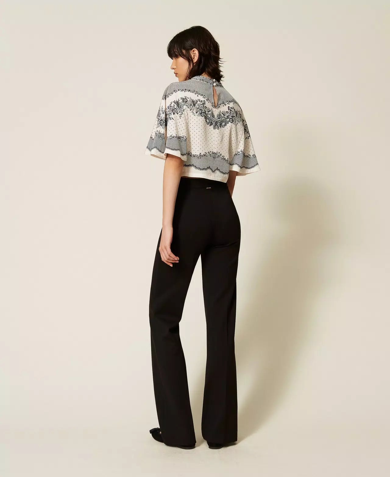 Pantaloni flare con piega Twinset